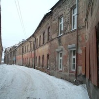 Autumnal Buildings in a Winter Landscape