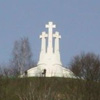 The Three Crosses logo